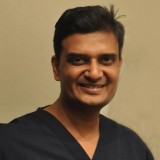 Dr. Milind Naik